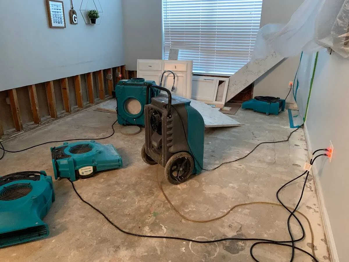 Dehumidifier in flood-cut room for Water Damage Restoration in Auburn